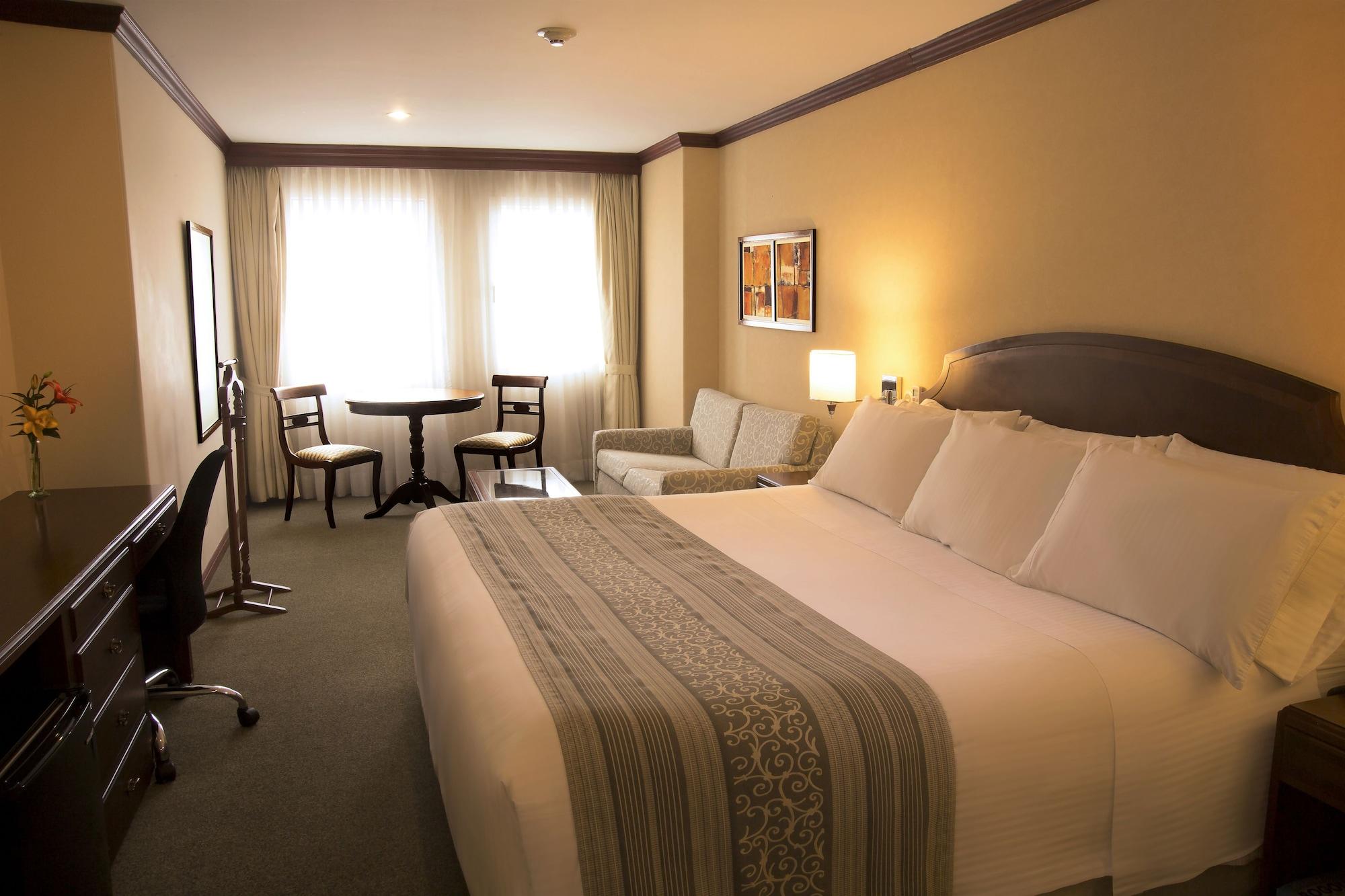 Hotel Dann Carlton Bogotá Exteriér fotografie A room at the hotel