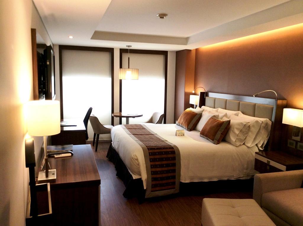 Hotel Dann Carlton Bogotá Exteriér fotografie A room at the hotel